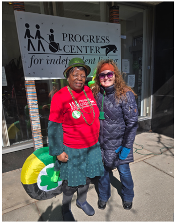 Carol pictured here on the right with coworker Esther during the St. Patrick's Day parade.